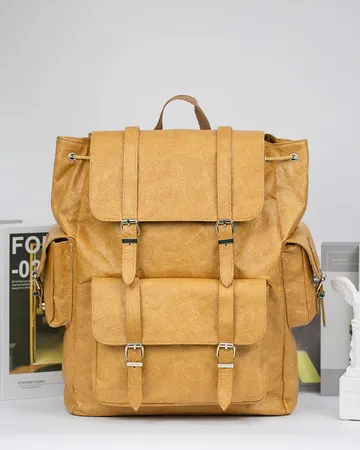 Backpack — Tyvek finished with buckle details.