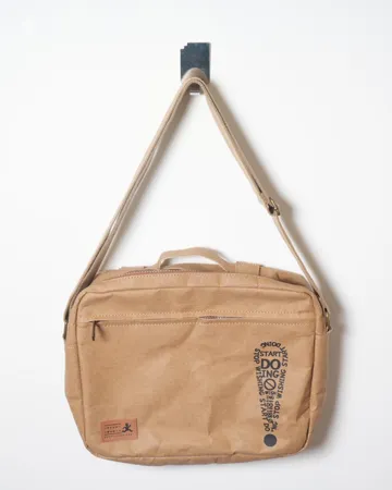Messenger — An adjustable strap for light, hands-free carry.